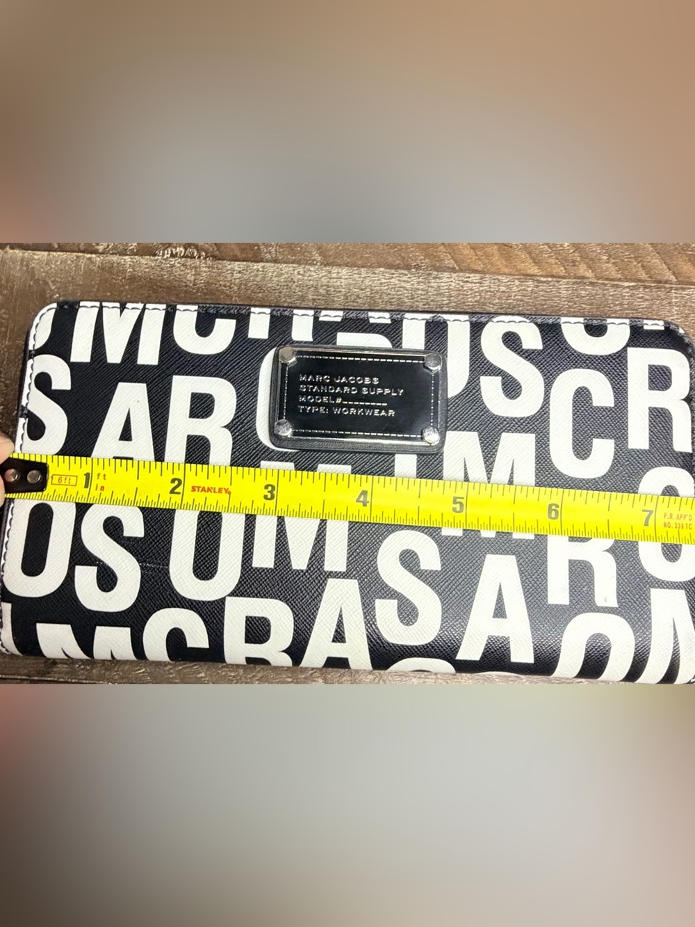Title:
Marc by Marc Jacobs Standard Supply Workwear Black & White Zip Wallet